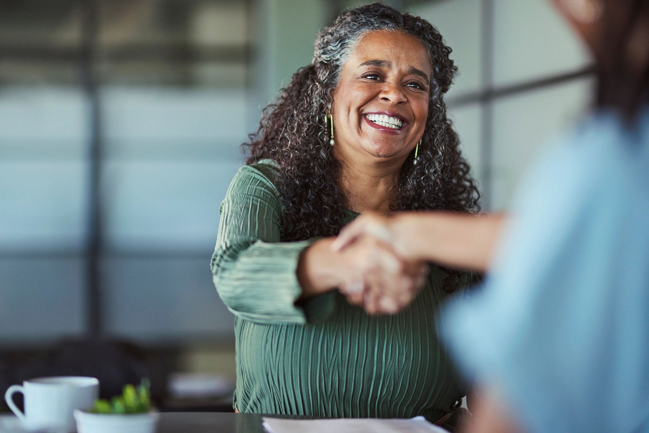 Professional portrait of an executive smiling